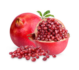 Fresh ripe pomegranate with green leaves isolated on white background