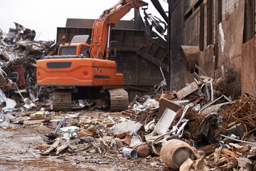 Sorting through the junk. Cropped shot of a pile of equipment and scrap metal.