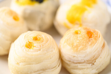 Chinese pastry stuffed with many sweet such as mung bean, egg yolk or custard