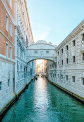 Fototapeta na wymiar Beautiful view of the Bridge of Sighs on one of the Venetian canal near San Marc Square in Venice, Italy