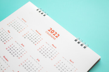 2022 calendar page on blue background business planning appointment meeting concept