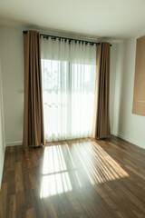 Obraz premium Curtain window interior decoration in living room on sunny day with sunlight