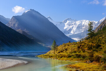 sacred mountain of Altai Belukha in the morning sun in the Ak-Kem valley