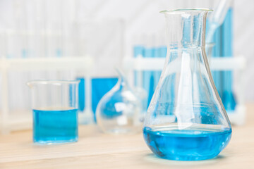 Laboratory glassware with test tubes. flasks, dropper, petri dishes, measuring cups and cylinders for scientific laboratories,