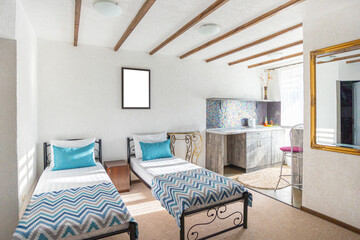 interior Two beds in a hotel room. white and blue pillows on a white sheet