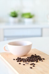 Black coffee in a white mug, Coffee beans