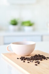 Black coffee in a white mug, Coffee beans