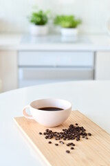 Black coffee in a white mug, Coffee beans