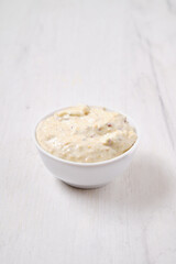 Small bowl with caesar sauce