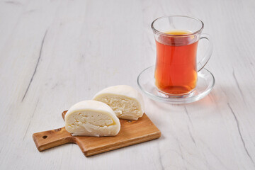 Sweet dessert mochi with coconut chips cut on half