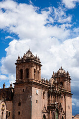 Fototapeta na wymiar Traditional catholic church in Cusco Peru. Colonial building in Peruvian Andes. Cathedral and main square in Cusco.