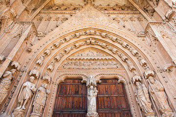Fototapeta na wymiar Antique passage with doors in the Palma Cathedral on Palma de Mallorca.