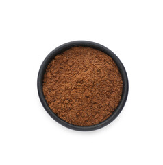 Bowl with nutmeg powder on white background, top view