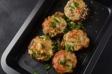 Stuffed mushroom caps with cream cheese, parmesan, garlic and herbs.