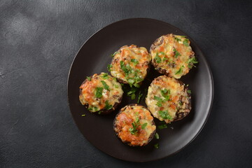 Stuffed mushroom caps with cream cheese, parmesan, garlic and herbs.