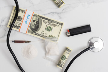 high costs of expensive medication concept , money and stethoscope.