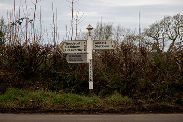 A rural road sign in Devon, England