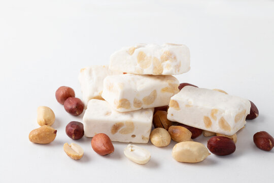Mini nougats with peanuts. Copy space.