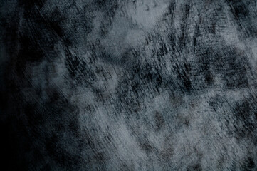 Wall panel grunge black or dark grey concrete background.Backdrop Dirty,dust black wall concrete,cement blackboard texture and splash brush stroke for architecture or abstract background.Blurred image