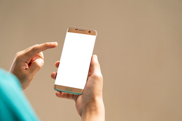 Cropped shot view of man hands holding smart phone with blank copy space screen
