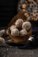 still life photo of healthy, homemade, delicious sweets. Tasty lactose and sugar free coconut balls with healthy ingredients