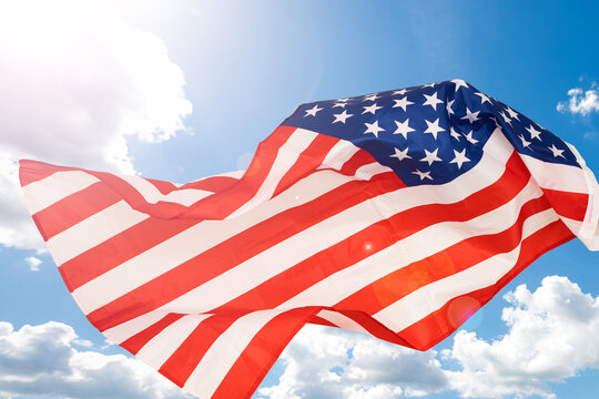 waving flag in the blue sky usa colour and wave