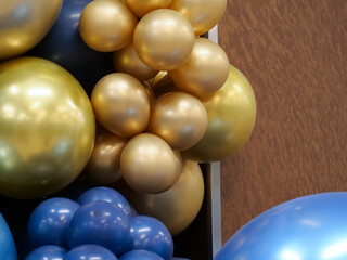 Balloons of gold and blue colors