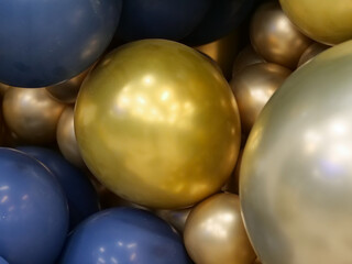 Balloons of gold and blue colors