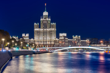 View of the sparkling Moscow River, Stalin's high-rise building on Kotelnicheskaya Embankment from Zaryadye Park
