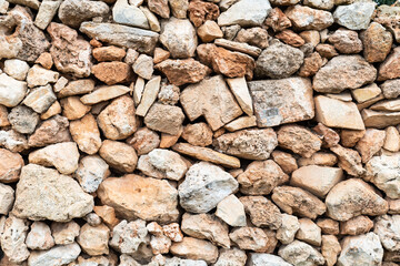 Traditional nature stone wall, with textured rock structure surface, Selmun, Malta