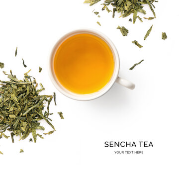 Creative layout made of cup of sencha tea on the white background. Flat lay. Food concept.