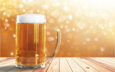 Beer in mug on wooden table with Christmas background