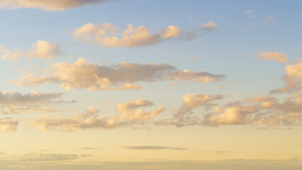 sunlit twilight sky with clouds