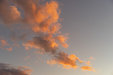 Fototapeta na wymiar beautiful pink and yellow clouds at sunset
