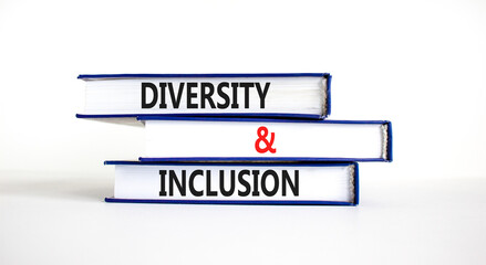 D and I, Diversity and inclusion symbol. Concept words D and I, diversity and inclusion on books on beautiful white table white background. Business, D and I, diversity and inclusion concept.
