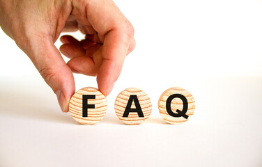 FAQ frequently asked questions symbol. Concept words FAQ frequently asked questions on wooden circles on a beautiful white background. Business and FAQ frequently asked questions concept.