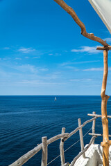 Obraz premium Wood railing with ocean views in Alaior, Menorca (Spain).