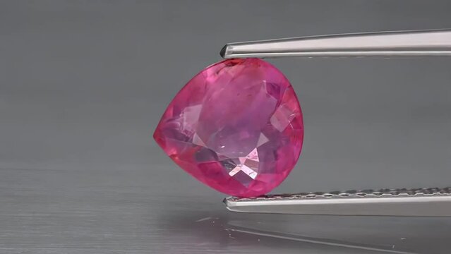 natural pink tourmaline rublitte on the turning table
