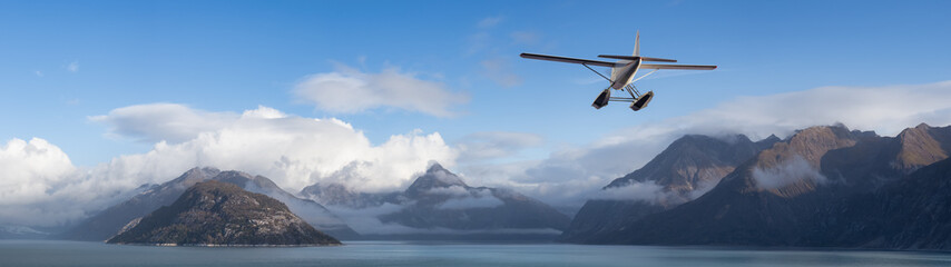 Fototapeta na wymiar Seaplane Aircraft Flying over the Pacific Ocean Coast. Cloudy morning Colorful Sky.. 3d Rendering Adventure Dream Concept Artwork. Background Nature Image from Glacier Bay National Park, Alaska.