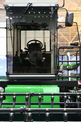 Details and components of agricultural machines. Fragment of an agricultural machine. Combine harvester. Cabin.