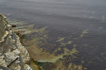 Image of the rocky shores of the cold sea.