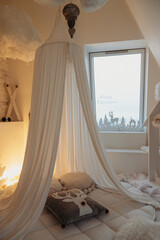 White canopy with garland