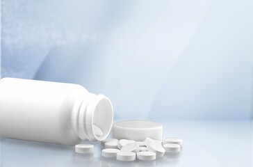 Concept of antiviral pill against coronavirus disease. COVID drugs on a medical table.