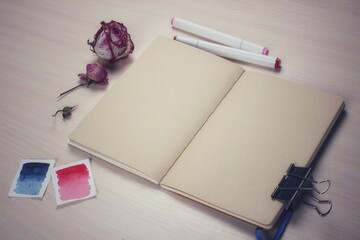 Art, materials sketchbook with paper clip, markers, dried flowers, mockup for inserting images