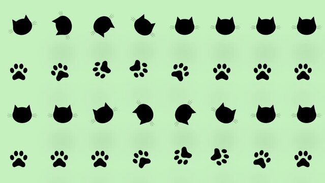Colorful pattern of black cat heads and paws on green background. Seamless pattern with cat paw and faces. Animal silhouette. 4K video motion