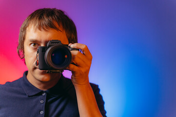 Photographer. Portrait of a photographer with a camera.