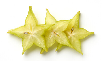 Fototapeta premium Three slices of fresh ripe carambola or star fruit