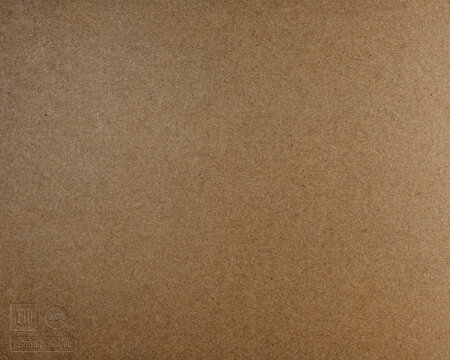 Surface Of  Paperboard Made From Recycled Brown Fibers With Embossed Logos