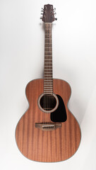 Fototapeta na wymiar Traditional mahogany acoustic guitar
