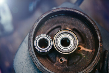 man works on the Internet with a laptop in glasses in a coworking cafe, the concept of freelancer remote work.
